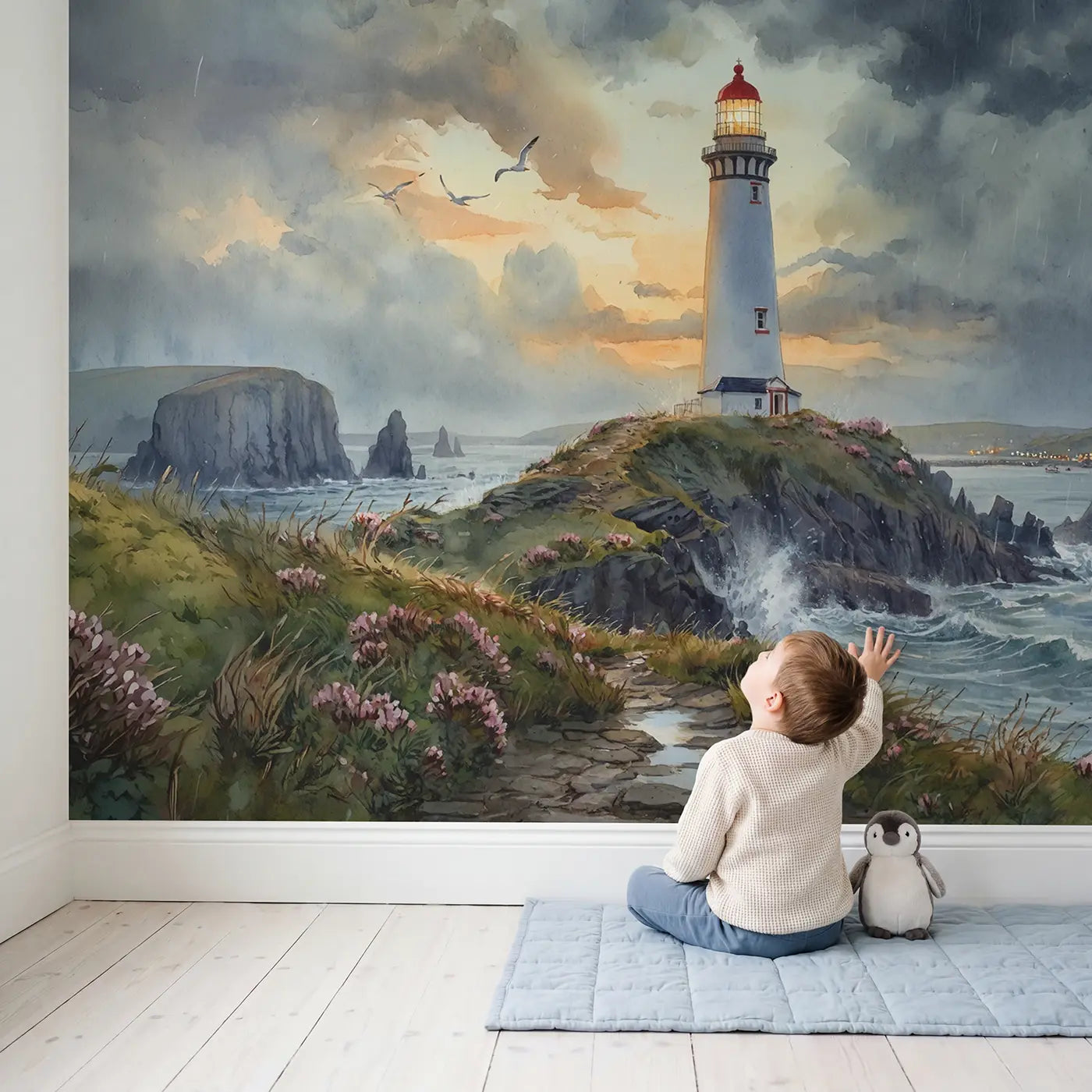 Child in nursery with Rocky Headland Lighthouse Wallpaper Mural by Whimsy Tots