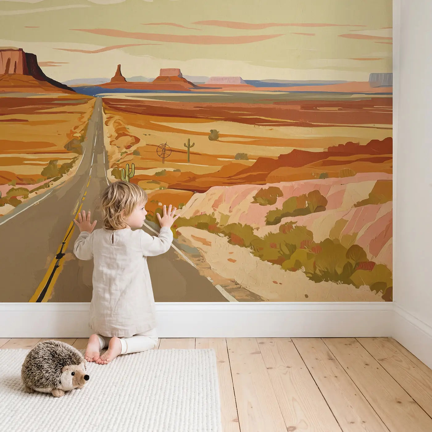 Child in nursery with Endless Desert Highway Wallpaper Mural by Whimsy Tots