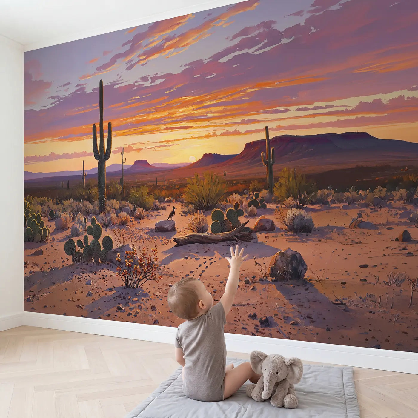 Child in nursery with Desert Sunset Fire and Purple Wallpaper Mural by Whimsy Tots