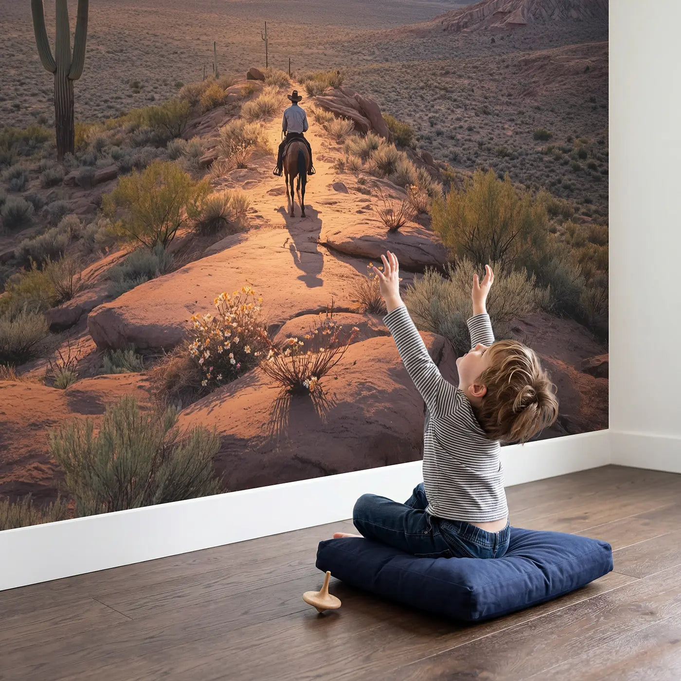 Child in nursery with Desert Ridge Cowboy Sunset Wallpaper Mural by Whimsy Tots