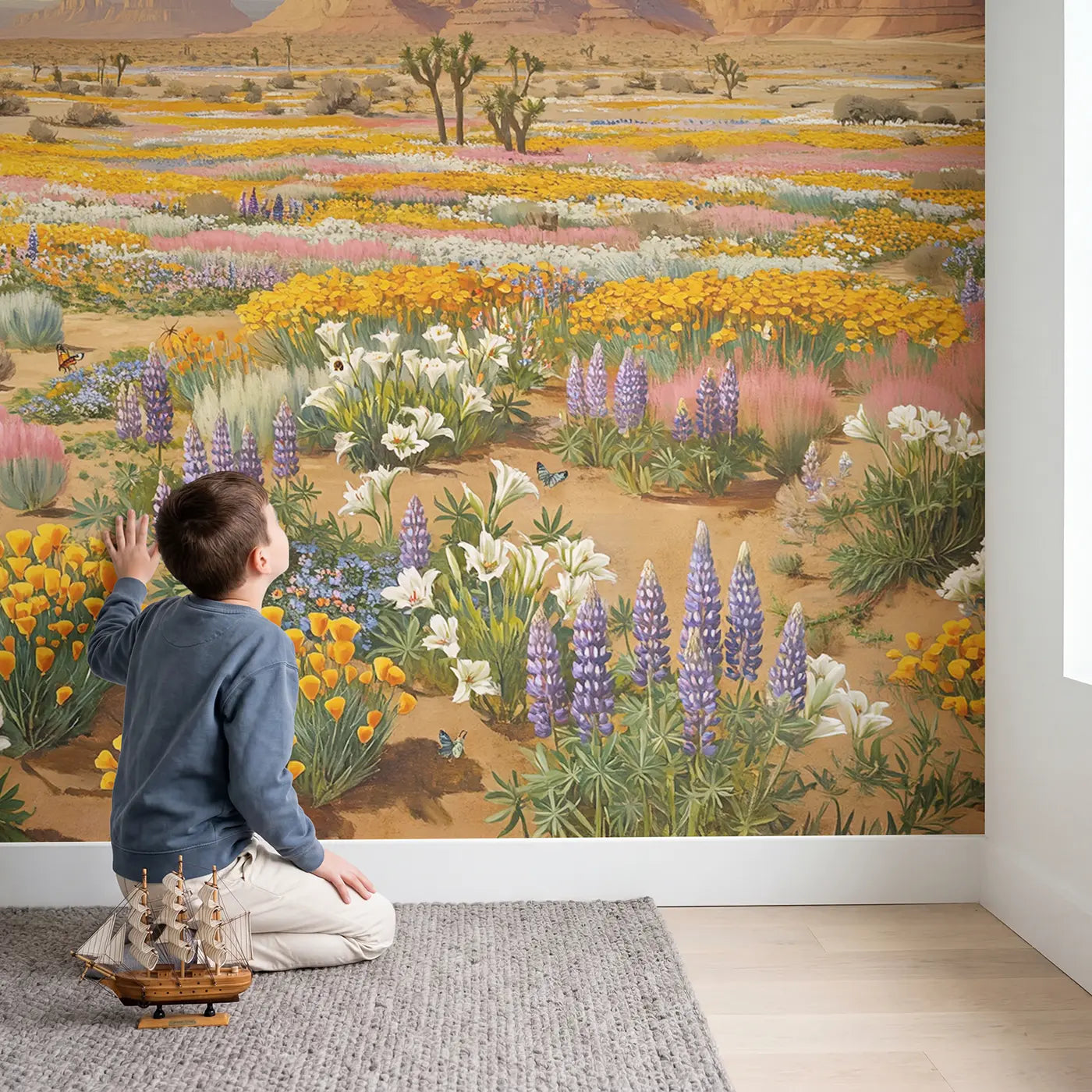 Child in nursery with Desert Super Bloom Wallpaper Mural by Whimsy Tots