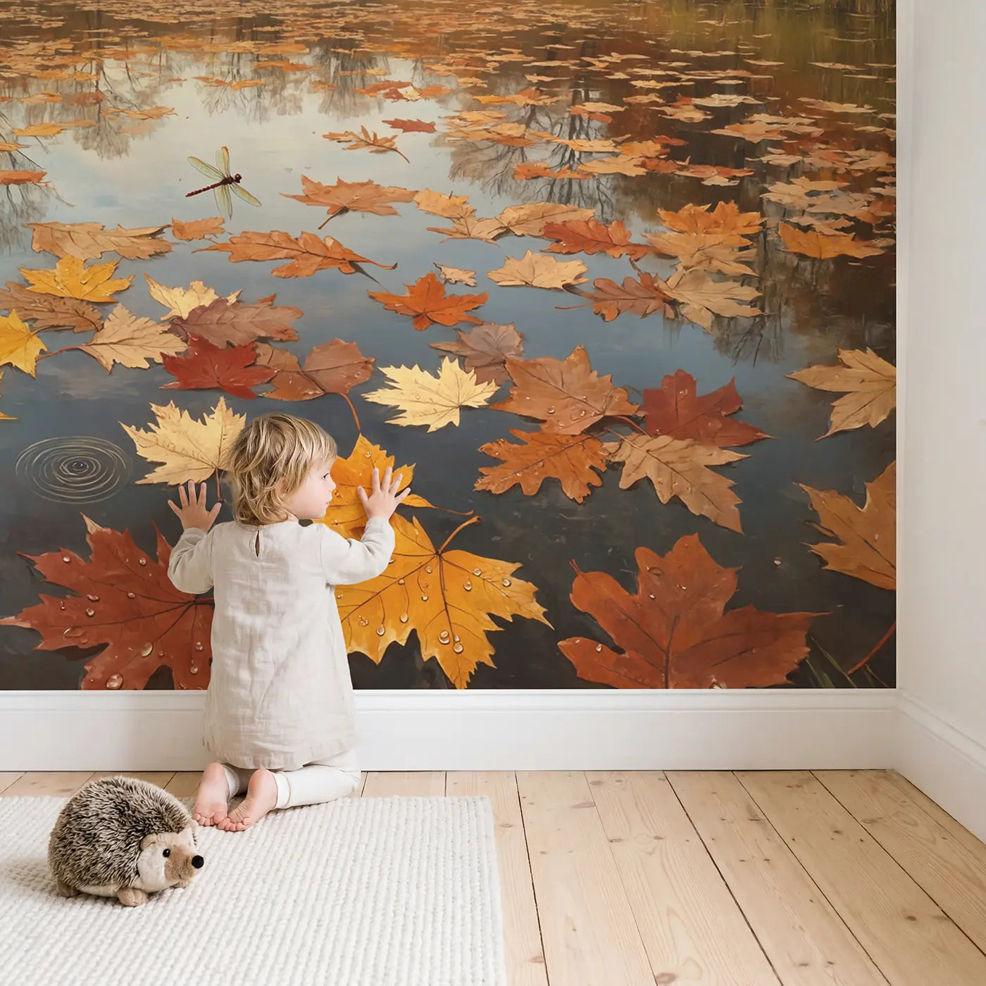 Child in nursery with Autumn Floating Leaf Pond Wallpaper Mural by Whimsy Tots