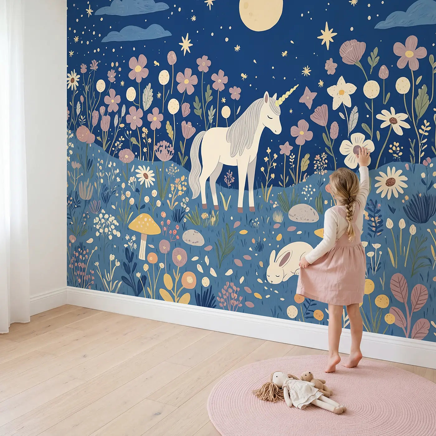 Child in nursery with Moonlit Unicorn Meadow Wallpaper Mural by Whimsy Tots