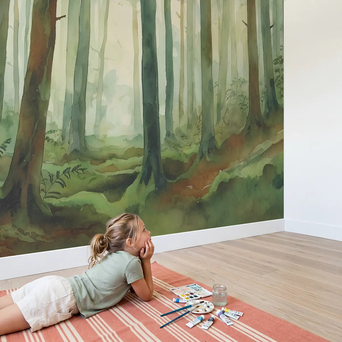 Child in nursery with Abstract Watercolor Forest Wallpaper Mural by Whimsy Tots