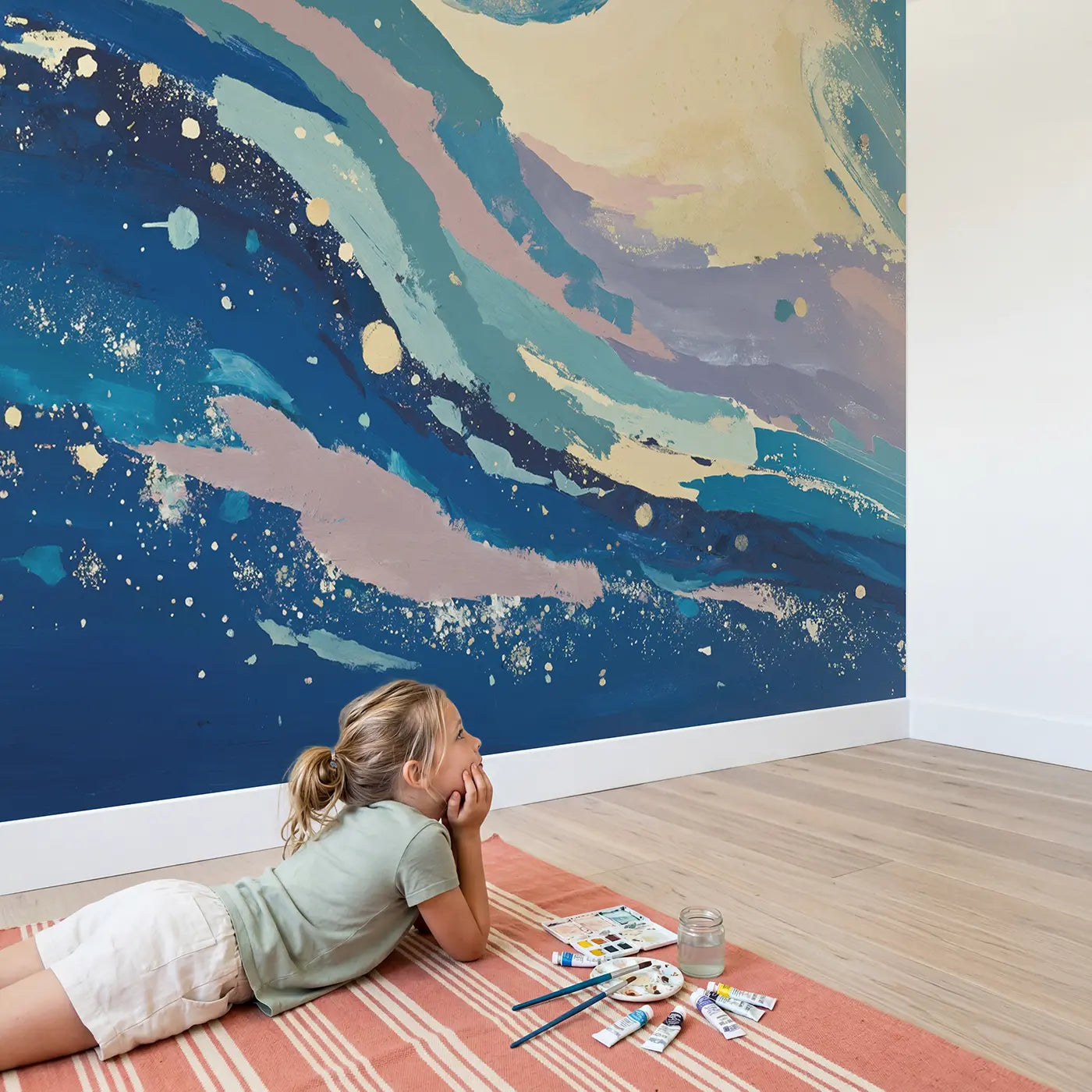 Child in nursery with Cosmic Spiral Abstract Wallpaper Mural by Whimsy Tots