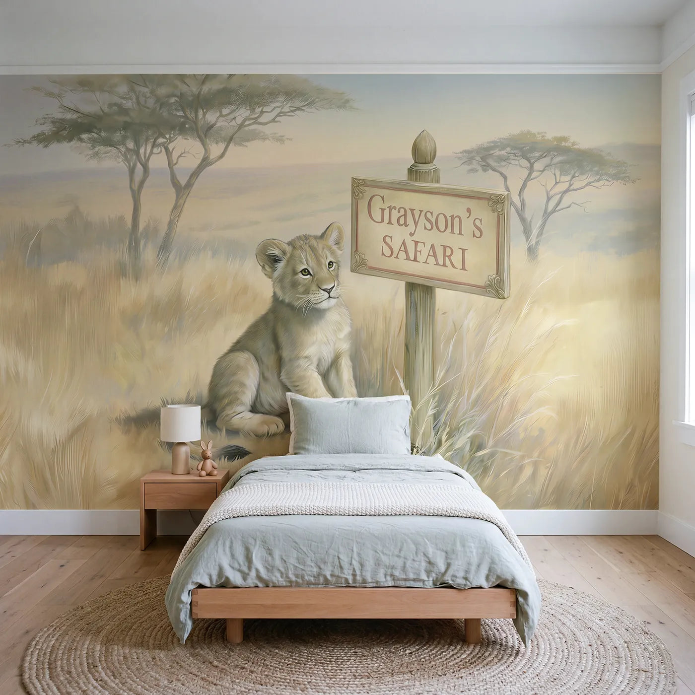 Storybook lion cub personalized wall mural with name signpost on golden savanna by Whimsy Tots
