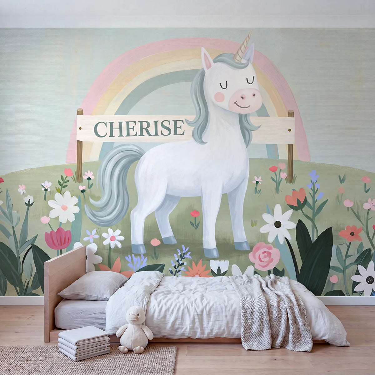 Rainbow Unicorn Sky Personalized Wall Mural in playroom setting by Whimsy Tots
