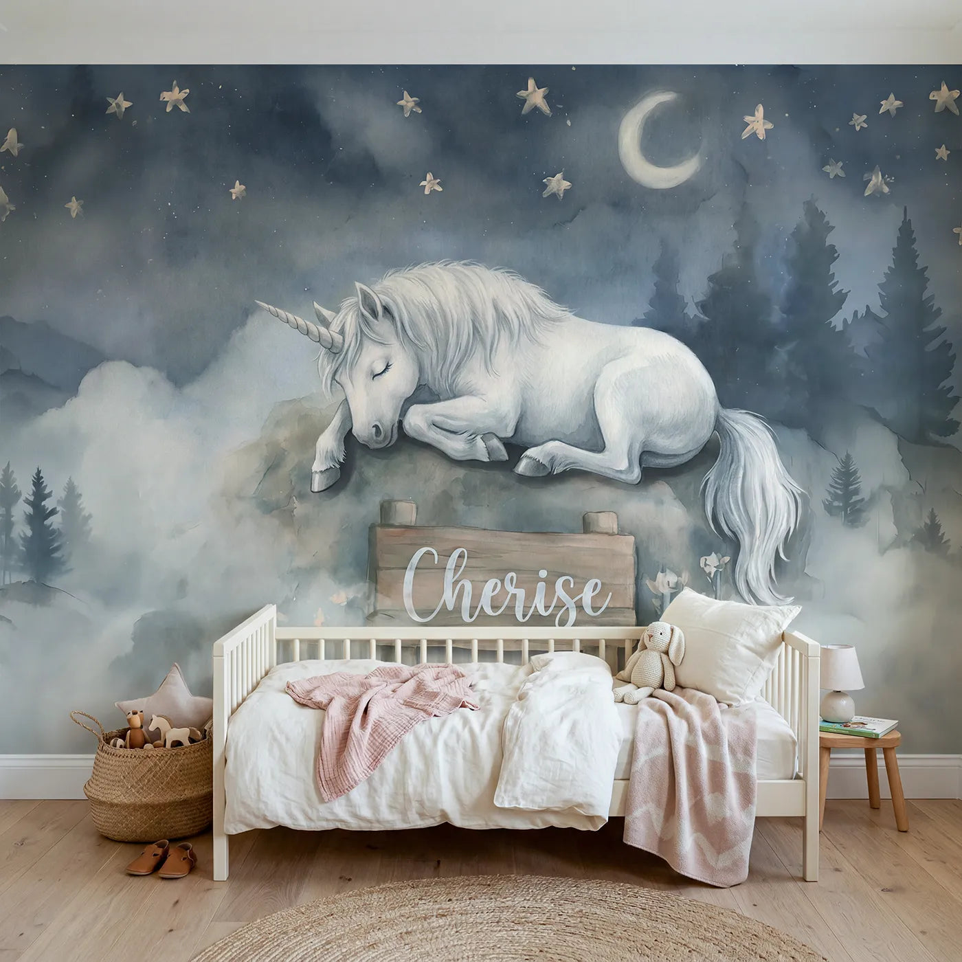 Watercolor sleeping unicorn under stars with a name on a rock, nursery mural by Whimsy Tots