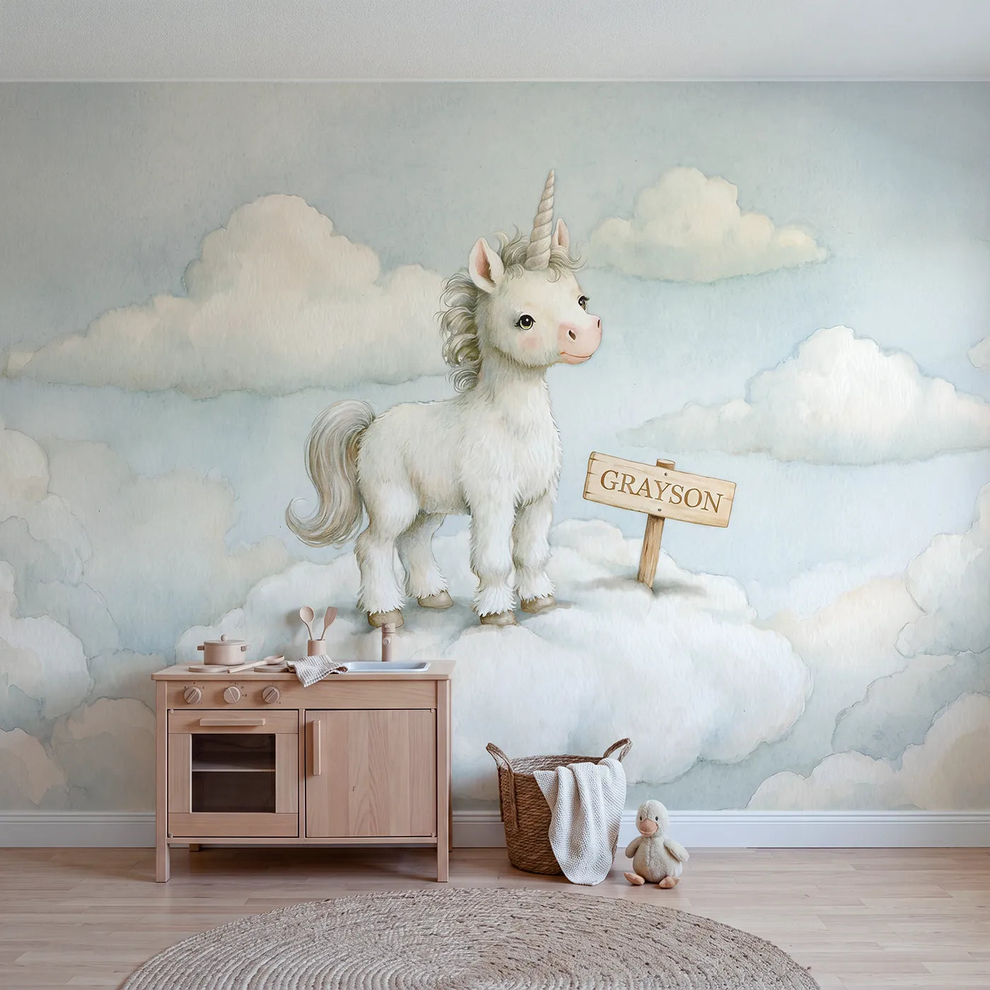 Colored pencil unicorn on a cloud with a name sign, gentle nursery mural by Whimsy Tots