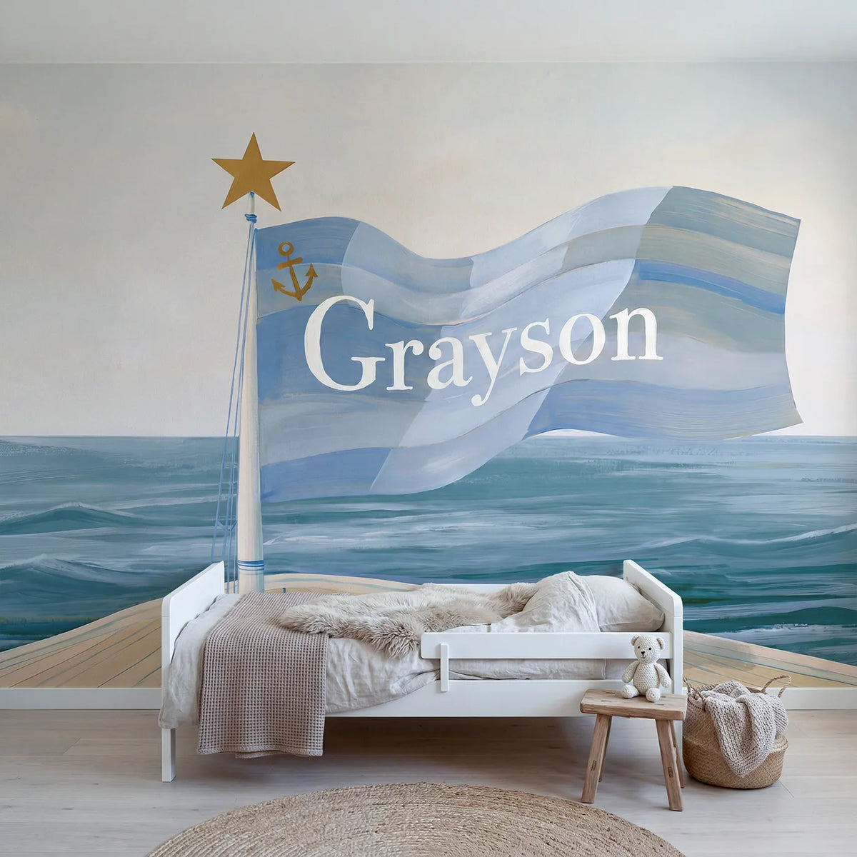 Modern illustration pirate flag with a star and a curved name, bedroom mural by Whimsy Tots
