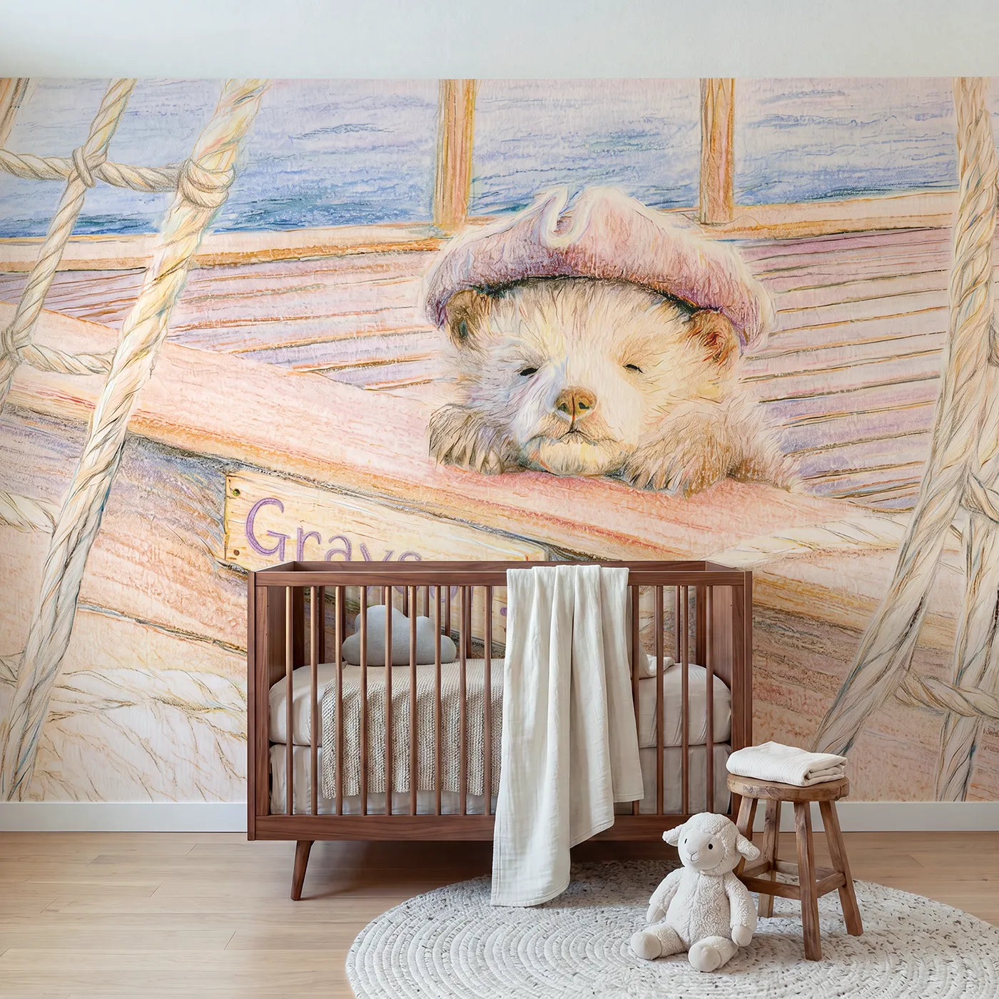 Colored pencil baby cub pirate on deck with a rail name sign, calm nursery mural by Whimsy Tots
