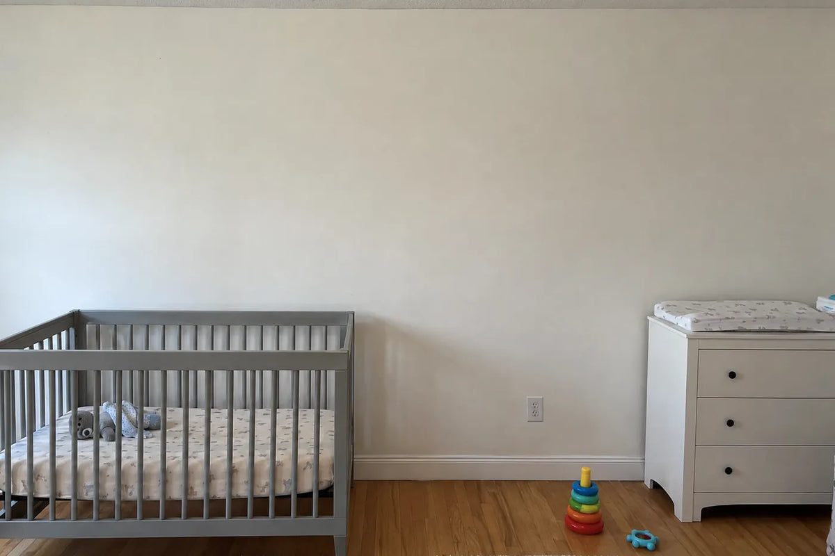 Watercolor personalized wall mural of a little elephant in a name blanket, the same room before, by Whimsy Tots
