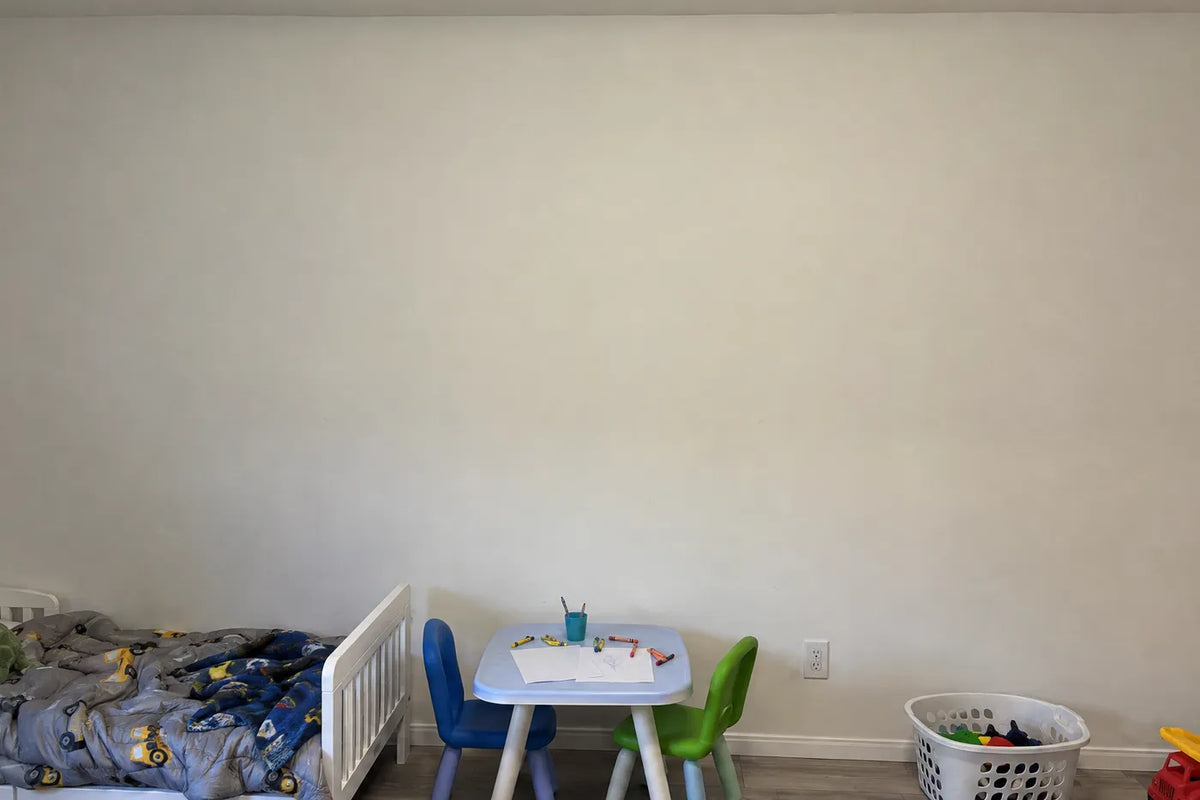 Gouache personalized wall mural of a lion cub on a jungle name swing, the same room before, by Whimsy Tots