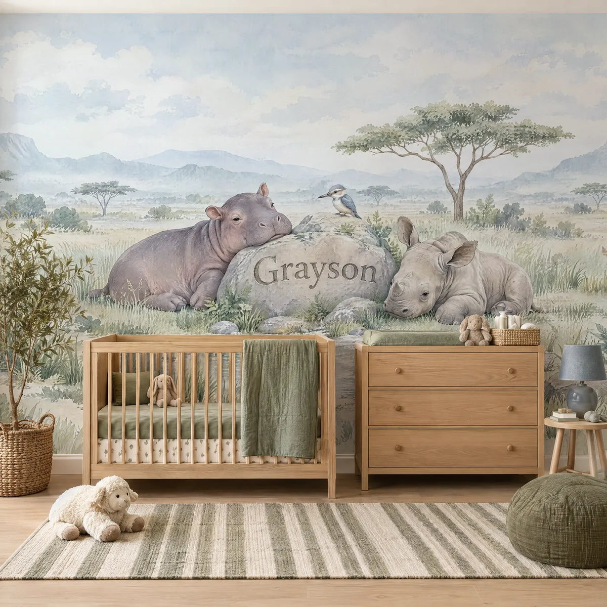 Watercolor personalized wall mural of a hippo and rhino by a name stone, in a styled room, by Whimsy Tots