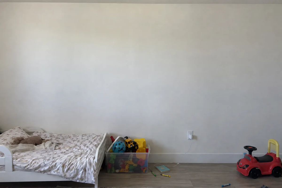 Storybook personalized wall mural of a cheetah cub in a name hammock, the same room before, by Whimsy Tots