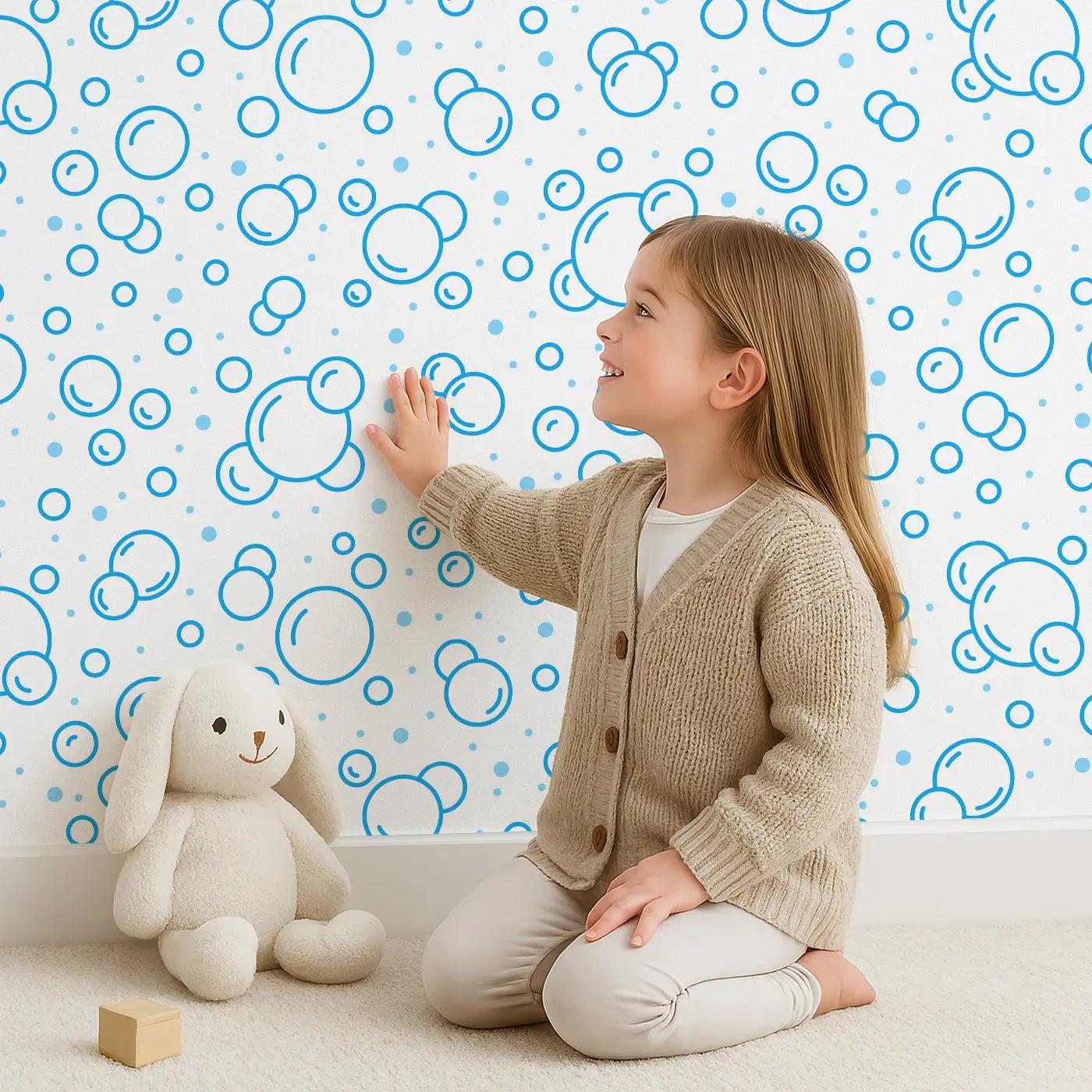 Child in front of Whimsy Tots Bubbly Bliss Wallpaper with bubble, circle, dot, abstract, watercolour in design.