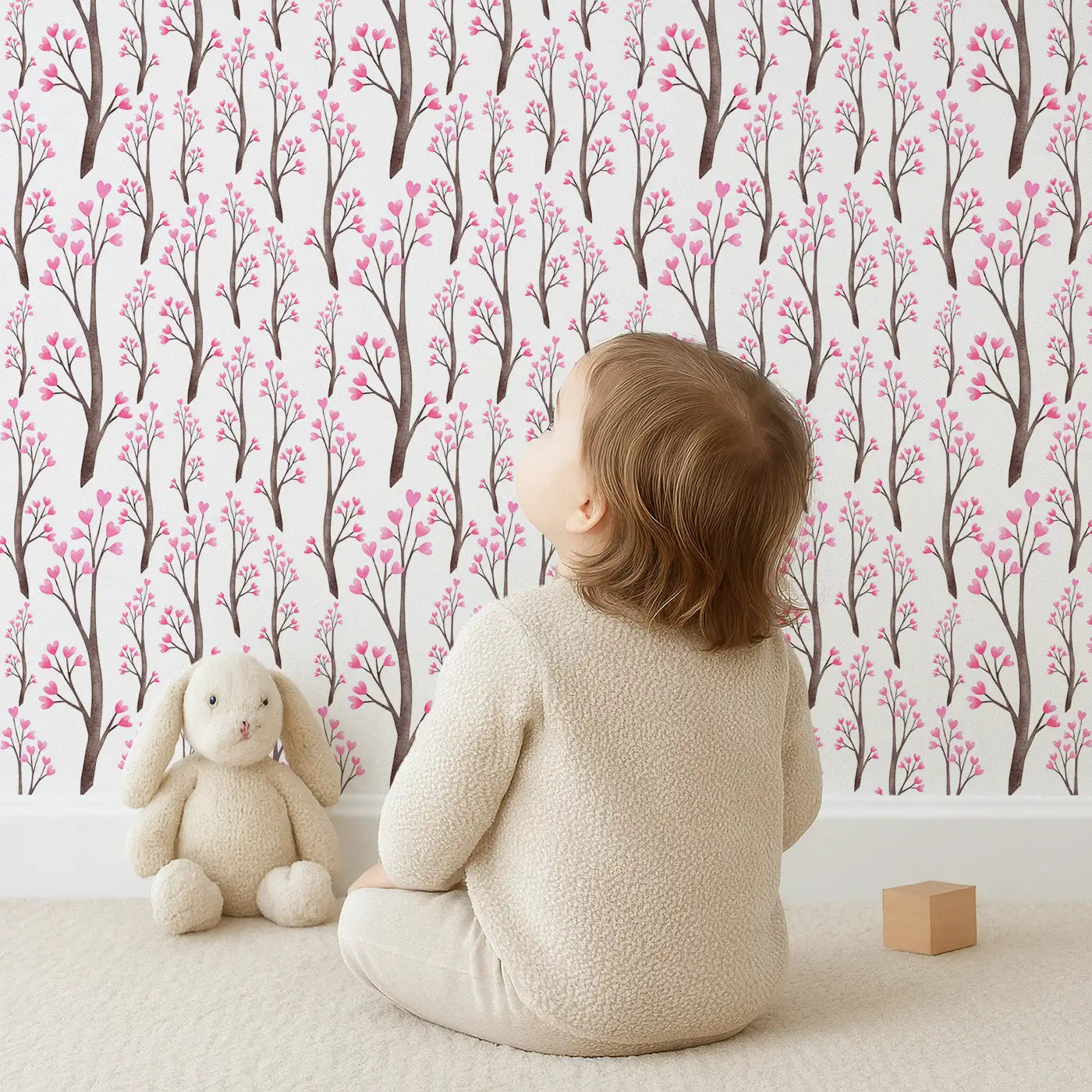 Child in front of Whimsy Tots Blushing Blossom Wallpaper with blossom, floral, nature, pink, garden, spring in design.