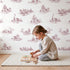 Cottage Toile Toss in Pink wallpaper in a cozy kids room - Whimsy Tots