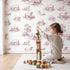 Lamb Toile Rows in Pink wallpaper in a cozy kids room - Whimsy Tots