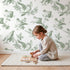 Dove Toile Toss in Green wallpaper in a cozy kids room - Whimsy Tots