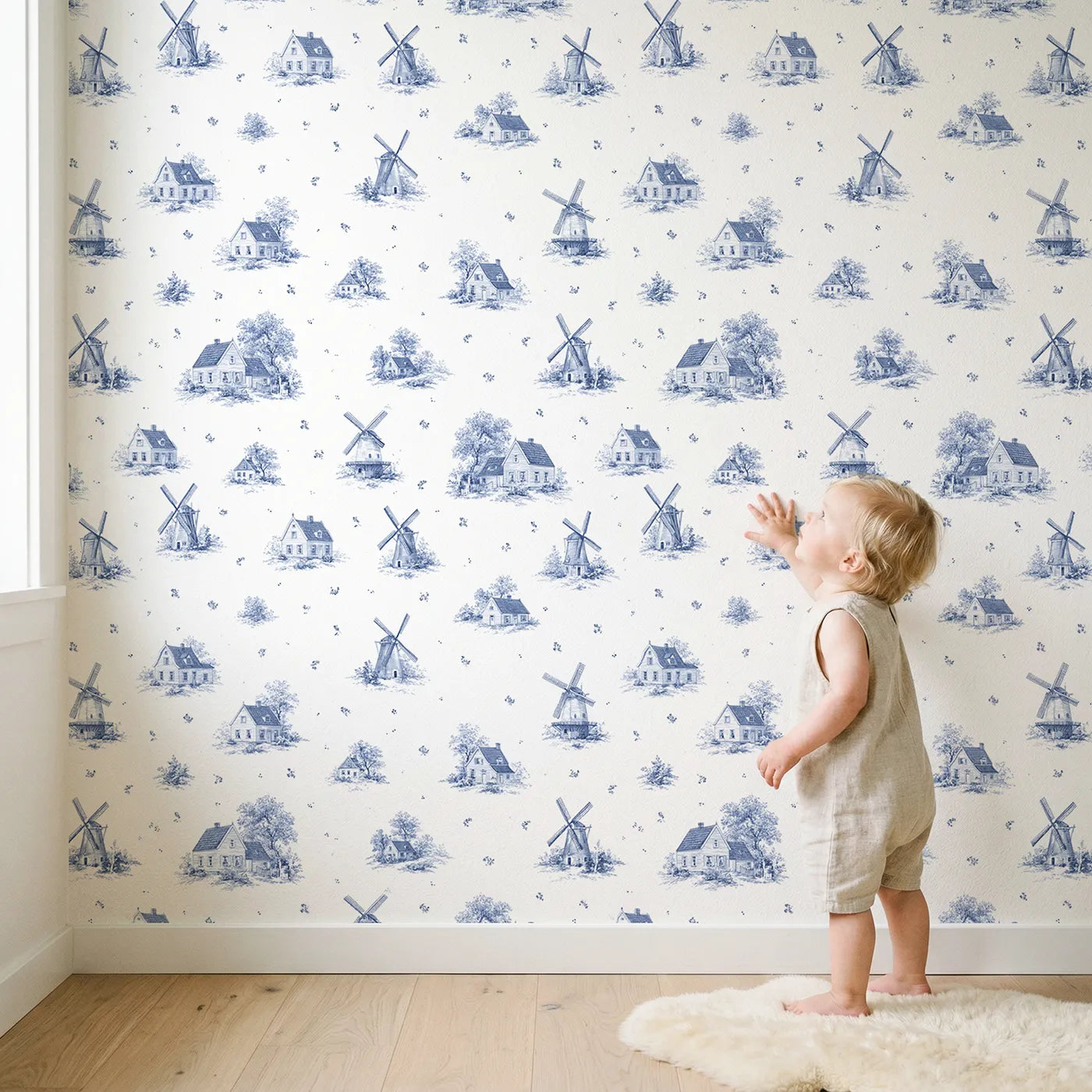 Windmill Toile Toss wallpaper in a cozy kids room - Whimsy Tots