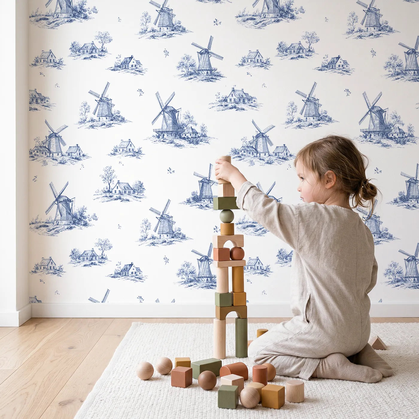 Windmill Toile Rows wallpaper in a cozy kids room - Whimsy Tots