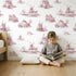 Windmill Toile Scene in Pink wallpaper in a cozy kids room - Whimsy Tots