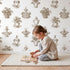 Fountain Toile Toss in Brown wallpaper in a cozy kids room - Whimsy Tots