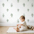 Fountain Toile Rows in Green wallpaper in a cozy kids room - Whimsy Tots