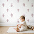 Fountain Toile Rows in Pink wallpaper in a cozy kids room - Whimsy Tots