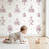 Fountain Toile Drop in Pink wallpaper in a cozy kids room - Whimsy Tots
