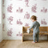 Fountain Toile Scene in Pink wallpaper in a cozy kids room - Whimsy Tots