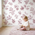Floral Sprig Toile Rows in Pink wallpaper in a cozy kids room - Whimsy Tots