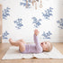 Floral Sprig Toile Scene wallpaper in a cozy kids room - Whimsy Tots