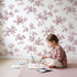 Blossom Toile Rows in Pink wallpaper in a cozy kids room - Whimsy Tots