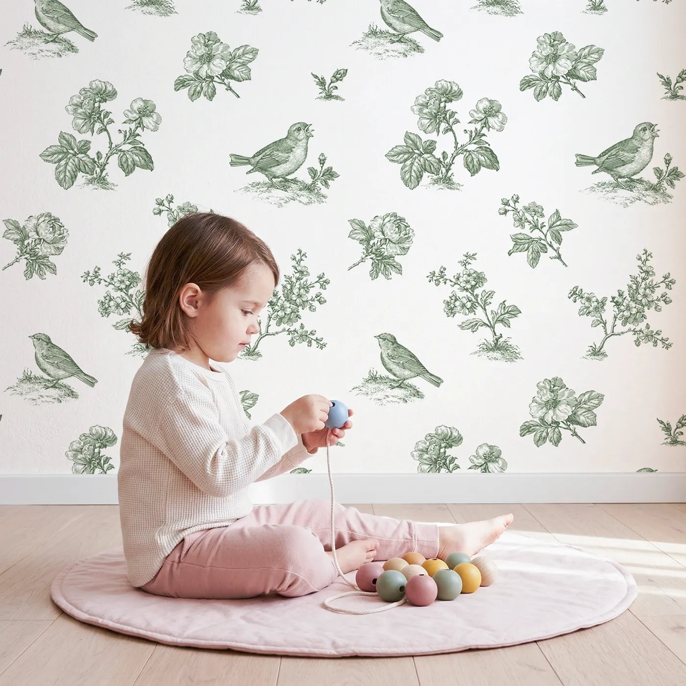 Blossom Toile Garden in Green wallpaper in a cozy kids room - Whimsy Tots