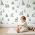 Deer Toile Scene in Green wallpaper in a cozy kids room - Whimsy Tots
