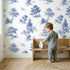 Oak Toile Toss wallpaper in a cozy kids room - Whimsy Tots