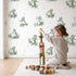 Pastoral Toile Rows in Green wallpaper in a cozy kids room - Whimsy Tots