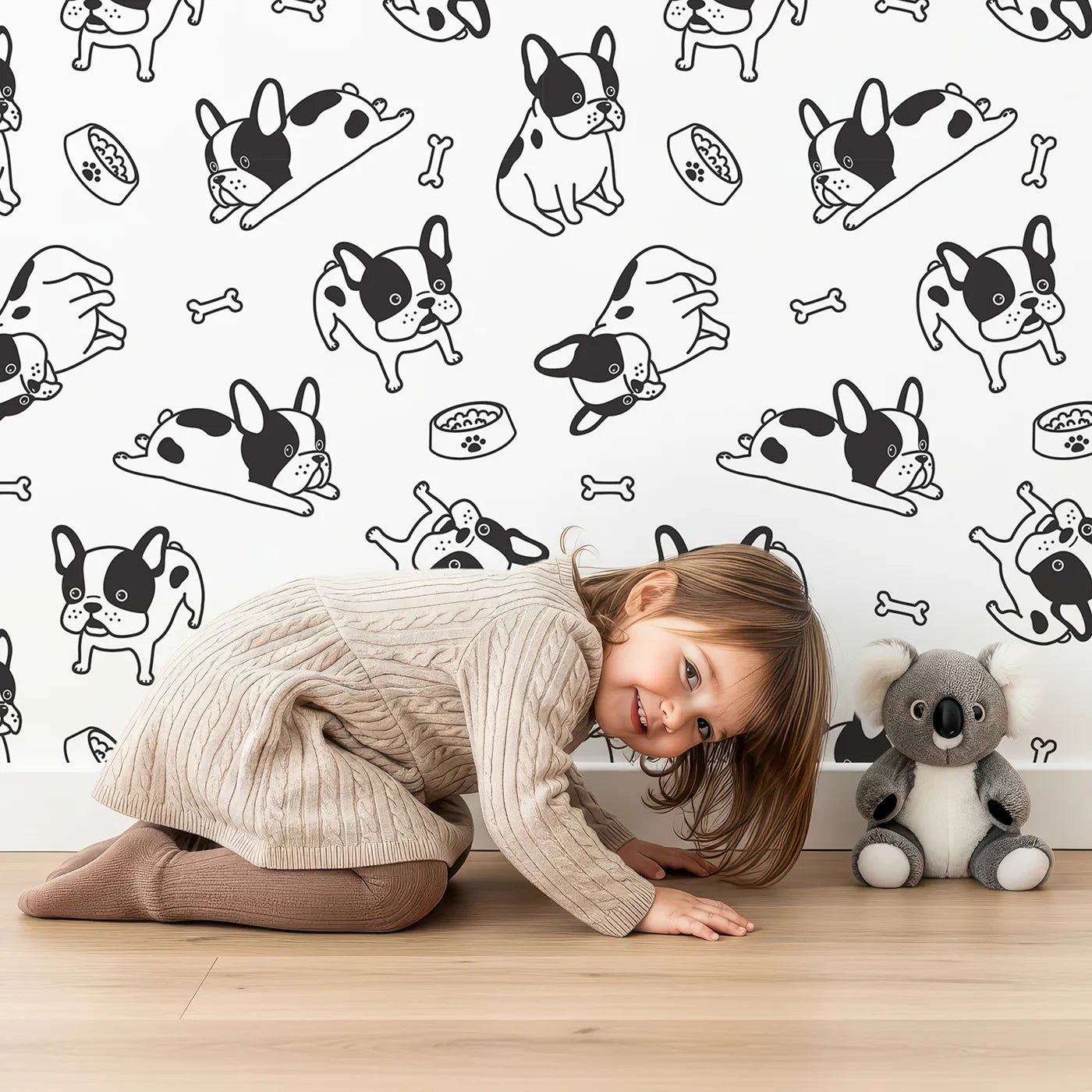 Lovely child standing in front of Whimsy Tots Playful French Bulldog Wallpaper with dog, puppy, french bulldog, pet, bone in design.