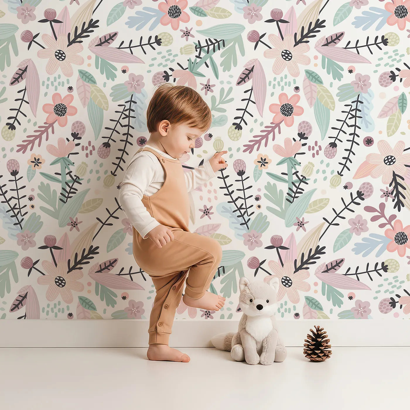 Lovely child standing in front of Whimsy Tots Pastel Wildflower Garden Wallpaper with flower, floral, botanical, pastel, modern in design.
