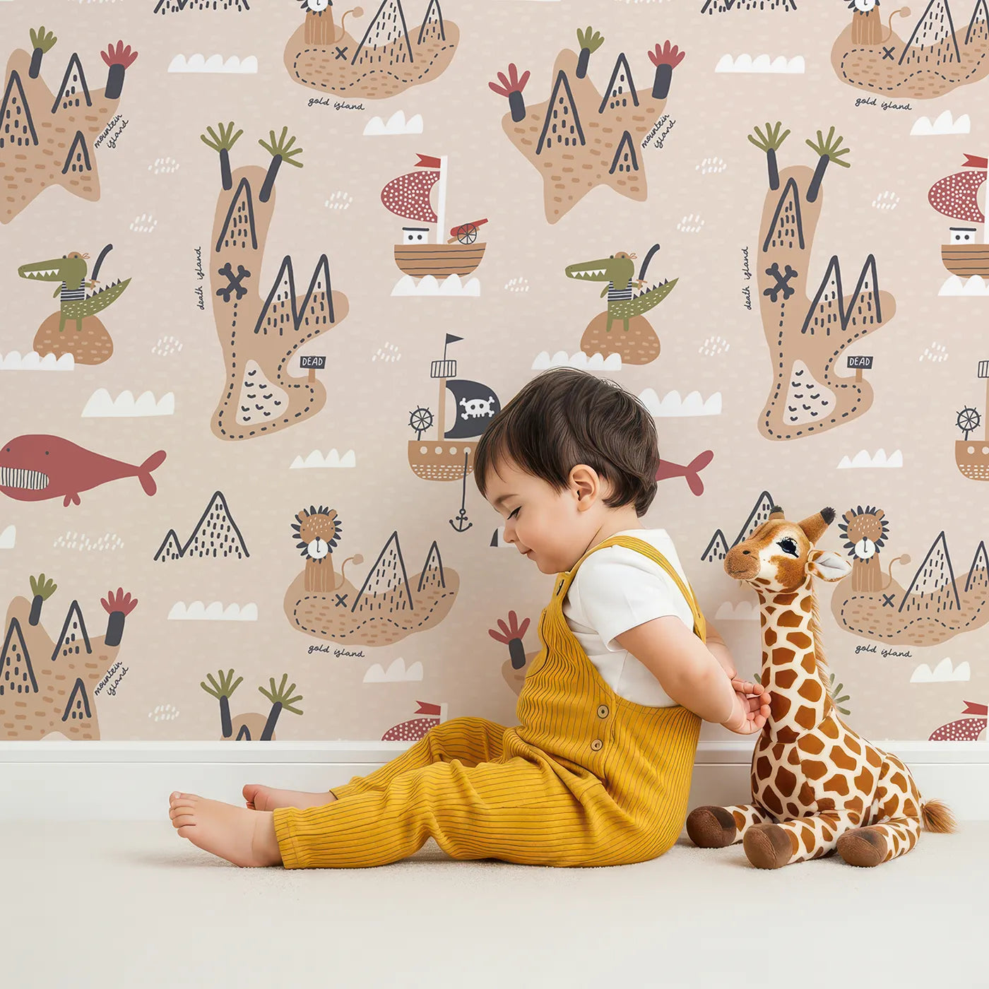 Lovely child standing in front of Whimsy Tots Pirate Adventure Map Wallpaper with pirate, map, ship, island, treasure in design.
