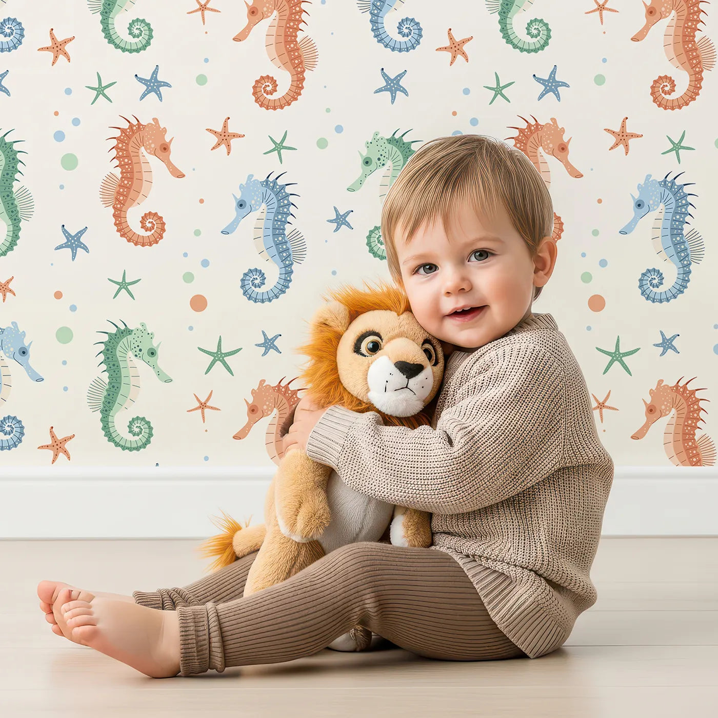 Lovely child standing in front of Whimsy Tots Colorful Seahorse Family Wallpaper with seahorse, starfish, ocean, sea, colorful in design.