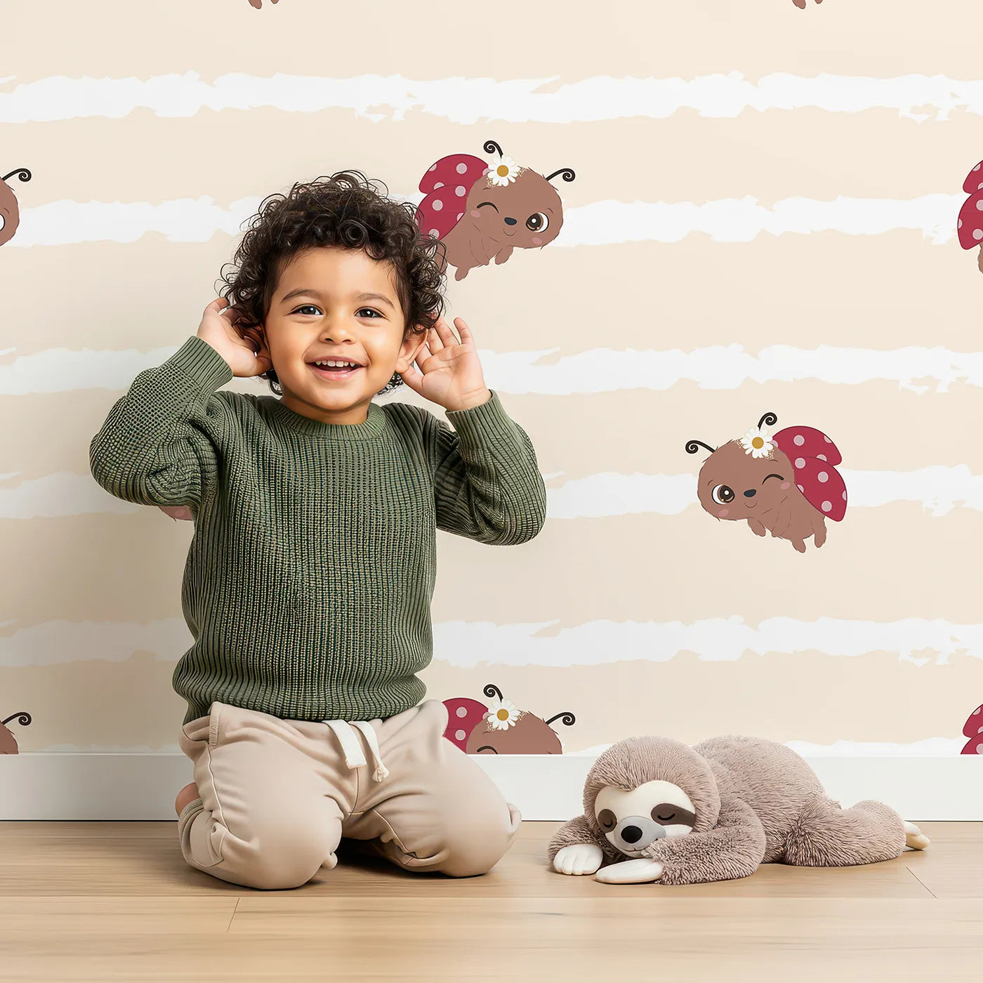 Lovely child standing in front of Whimsy Tots Winkie the Ladybug Wallpaper in Beige with ladybug, stripe, flower, bug in design.