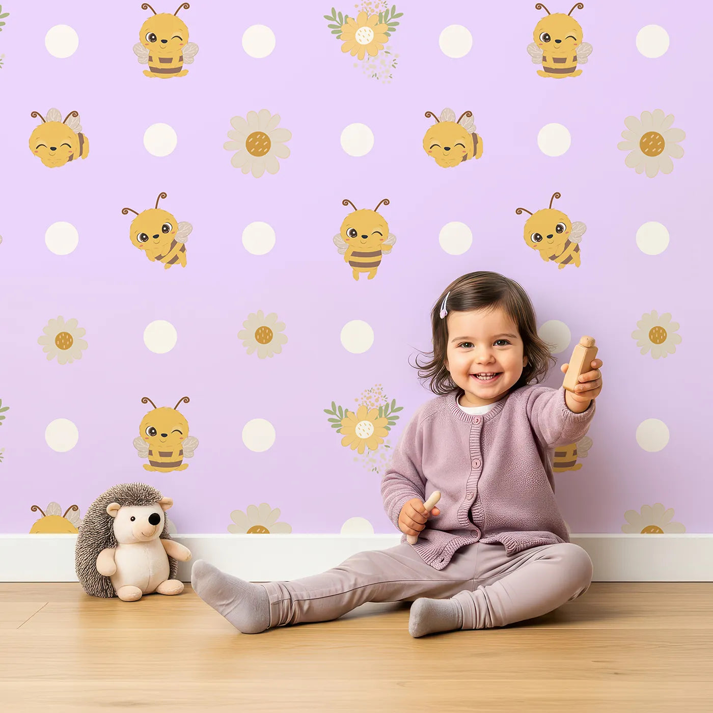 Lovely child standing in front of Whimsy Tots Buzzberry Bee Parade Wallpaper in Purple with bee, flower, daisy, dot in design.