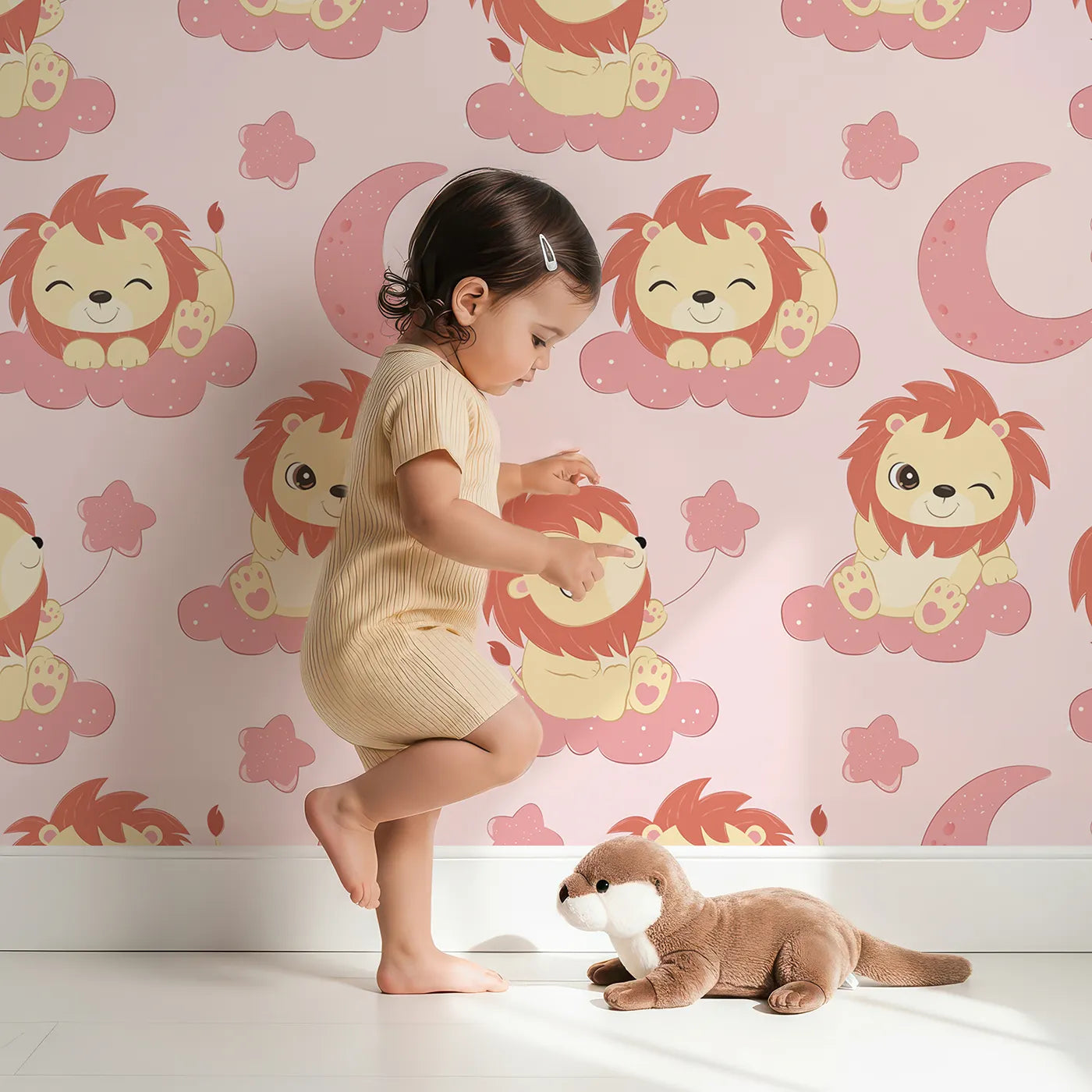 Lovely child standing in front of Whimsy Tots Starry Safari Dreams Wallpaper in Cream with lion, cloud, moon, star in design.