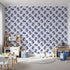 Front view of Whimsy Tots' Playful Raccoon Parade Wallpaper in Purple