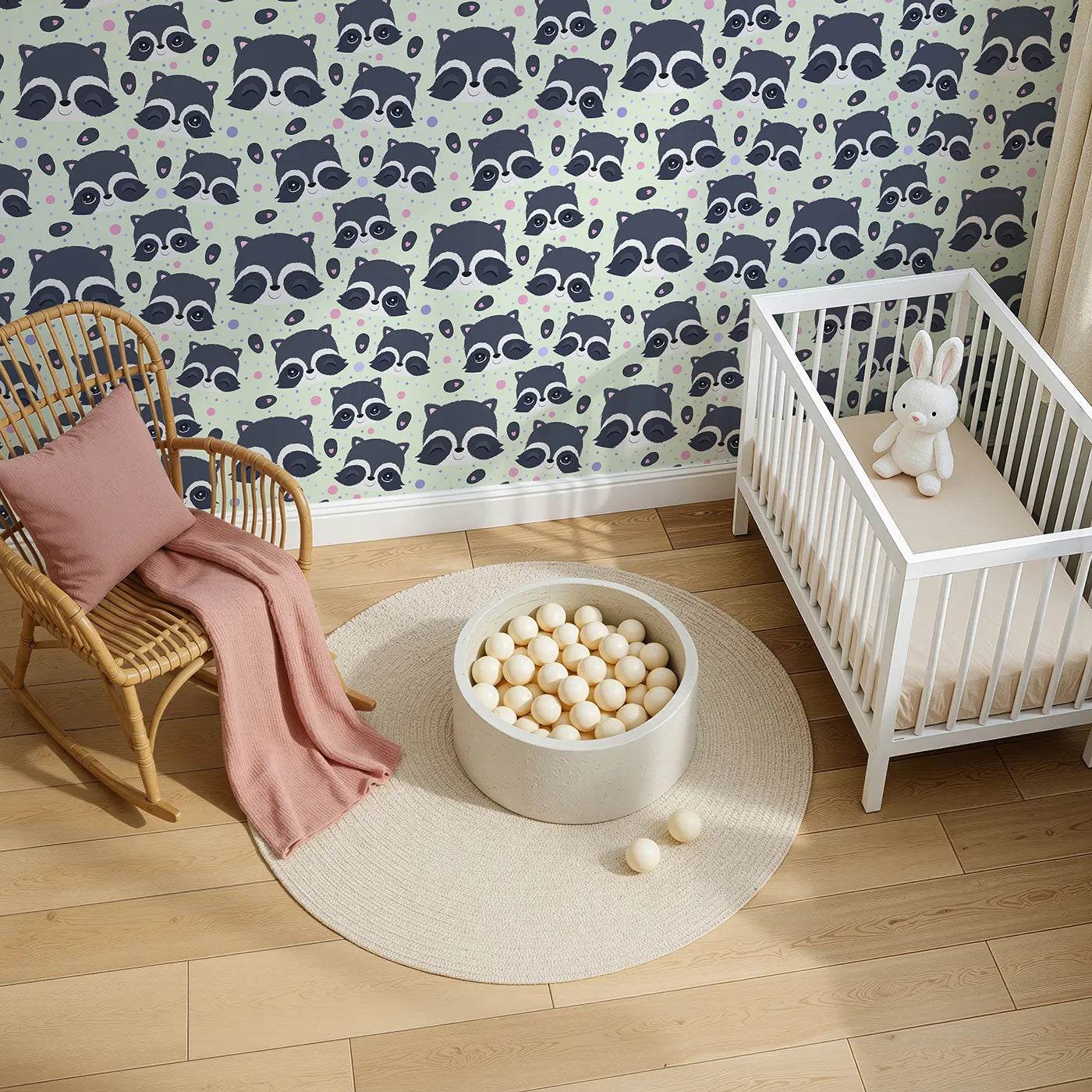 Top-Down view of Whimsy Tots' Winkie Raccoon Pals Wallpaper in Green (W3030D).Winking raccoons and soft sprinkles fill the room with joy.