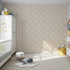 Front view of Whimsy Tots' Polka Dot Whimsy Wallpaper in Beige
