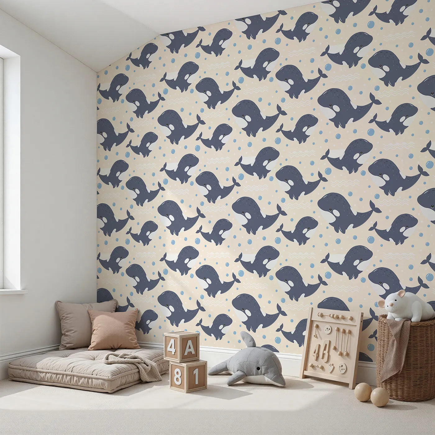 Angled view of Whimsy Tots' Orca Whale Wonder Wallpaper in Cream (W3045C).Playful orcas dance through cream-colored waves and bubbles.